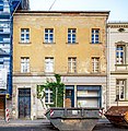 Wohnhaus in geschlossener Bebauung, mit Laden mit originaler Front