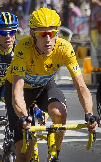 Wiggins in yellow, on his way to victory in the 2012 Tour de France in the ceremonial stage in Paris.