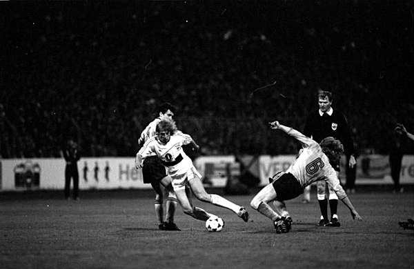 Jürgen Klinsmann (centre) against Dynamo Dresden in the semi-final of the 1988–89 UEFA Cup