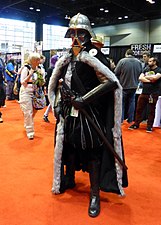 "C2E2_2014_-_Elizabethan_Darth_Vader_(14291925023).jpg" by User:AdamBMorgan