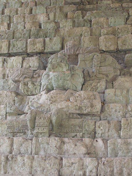 File:Carvings in the wall from the Mayan site Copán.jpg