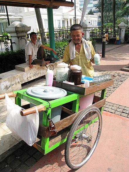 A hawker selling cendol (a dessert drink common across Southeast Asia) in Central Jakarta.