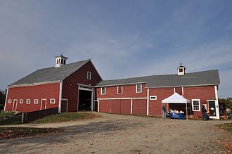 The 19th century barn; the rightmost portion is used for visitor facilities, while the balance is used for farm equipment and supplies. CogswellsGrant Barn.jpg