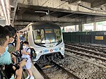 E71-E112 prepares to depart Sha Tin station for the final time