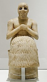 Statue of Ebih-Il, Mari on the Euphrates, made of gypsum alabaster (25th century BC)