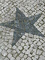 Estrela na calçada do passeio.