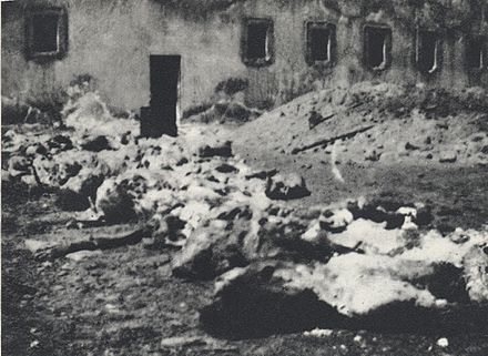 Exhumed bodies at the courtyard of Gęsiówka prison as part of the Polish government's inquiry into the crimes committed in the camp, September 1946
