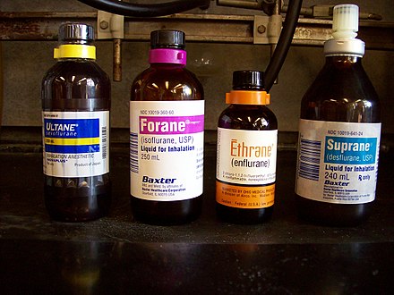 Bottles of sevoflurane, isoflurane, enflurane, and desflurane, the common fluorinated ether anaesthetics used in clinical practice. These agents are colour-coded for safety purposes. Note the special fitting for desflurane, which boils at room temperature.