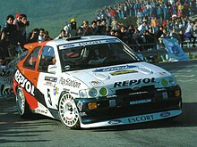 Bruno Thiry steers the Repsol Ford Escort RS Cosworth through the stages of the 1996 Rally Catalunya Ford Escort (group A).jpg