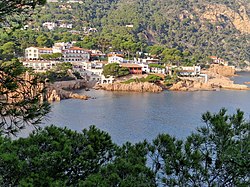 The village of Fornells viewed across the bay of Aiguablava