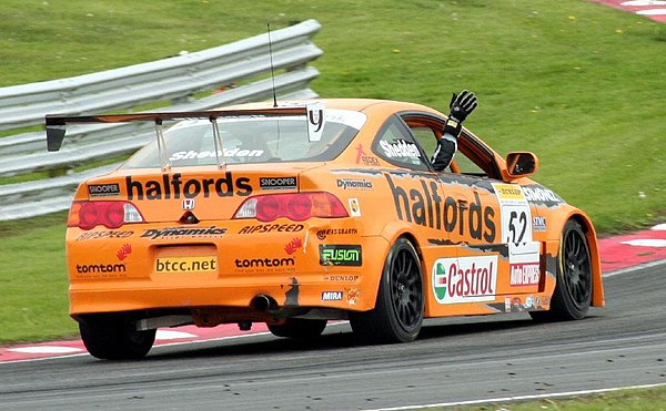 Shedden celebrates his first BTCC win at Oulton Park in 2006