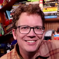 Hank Green just before the start of his chemotherapy treatment, with naturally straight hair.