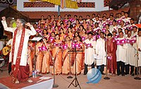 Konkani Nirantari, a Konkani cultural event, entered the Guinness Book of World Records for non-stop singing of Konkani hymns. Konkani Nirantari.jpg