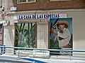 Graffiti on a tea and spices shop in Málaga, 2020-07-26.