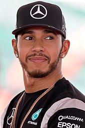 A picture of Lewis Hamilton donning Mercedes Grand Prix attire.