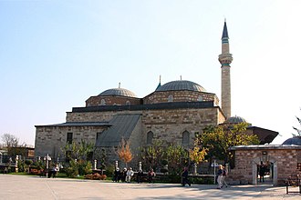 "We went to Rumi's tomb in Konya -- the Adem Dede dancehall, the one in which Ayse has the gallery, is based on the Konya dervish house" Mevlana museum entrance.JPG