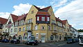 Apartment building in closed development and corner location