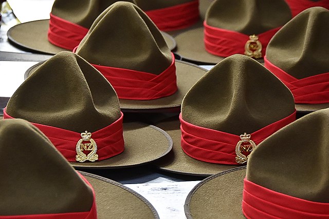 New Zealand Army felt campaign hats or "Lemon Squeezers" are adorned with coloured puggarees