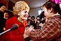 Pat Nixon speaks to a young Chinese girl while visiting China