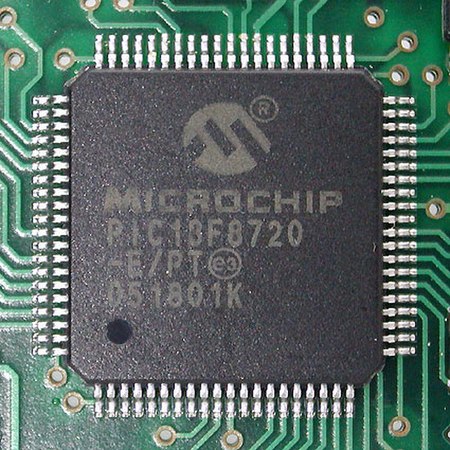 A PIC 18F8720 microcontroller in an 80-pin TQFP package