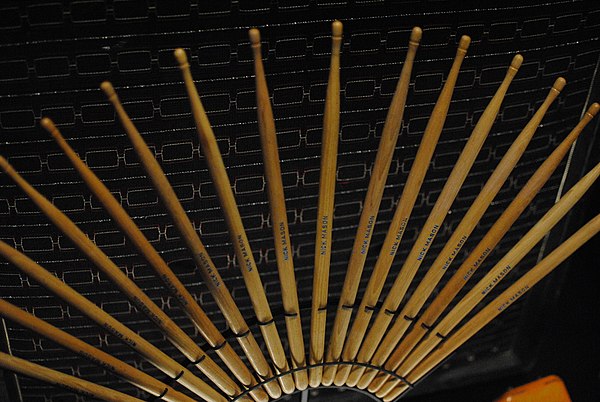 A selection of Mason's customised drumsticks, from various makers, displayed at the Pink Floyd: Their Mortal Remains exhibition