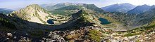 A panoramic view of two merging U-shaped valleys in Pirin mountain, Bulgaria Pirin ezera Pano Chairski ezera.jpg