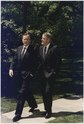 Bush and PM Brian Mulroney at White House. President Bush walks with Prime Minister Mulroney of Canada on the White House Grounds - NARA - 186392.tif