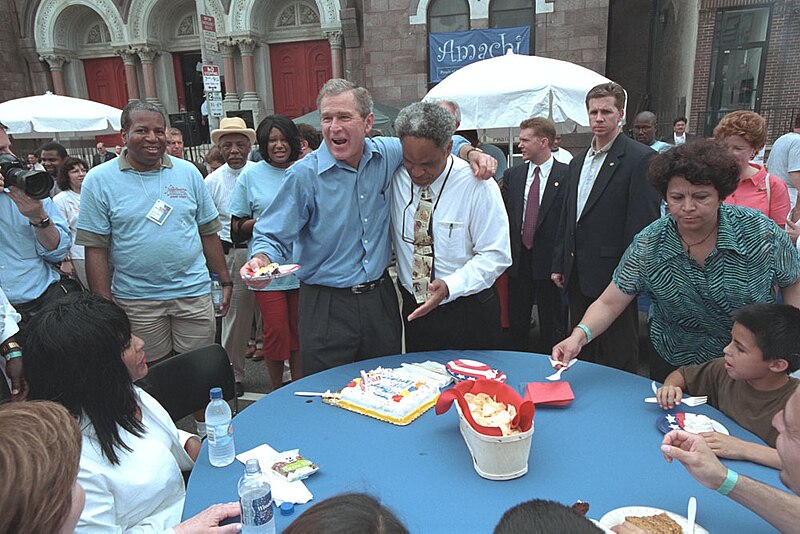 File:President George W. Bush Passes out Birthday Cake with Philadelphia Mayor John Street at an Independence Day Celebration.jpg