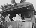 President Harry S. Truman on the rear platform of the presidential train, in Bolivar, Missouri. President Truman is... - NARA - 199925.jpg