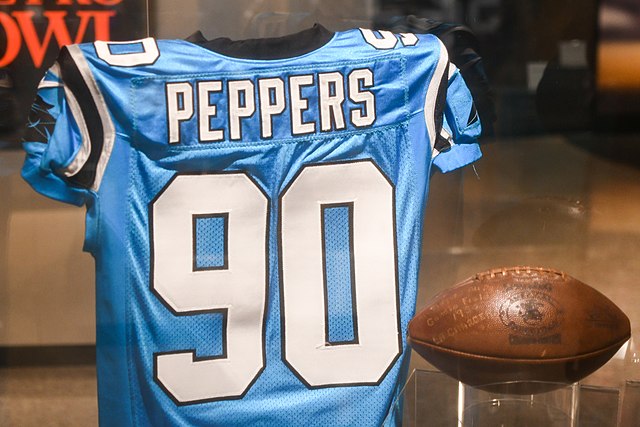Julius Peppers #90 jersey in the Pro Football Hall of Fame. Peppers played defensive end for the Panthers from 2002 to 2009 and later again from 2017 