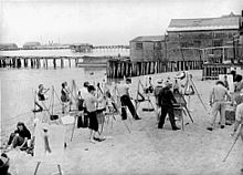 A 1940 photograph of an outdoor art class in Provincetown, Massachusetts, an art center that provided ample income for several art schools. Provincetown 1940 Art Class.jpg