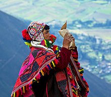 A Curanderos performing a ceremony Q'eros Paqo calling Apu.jpg