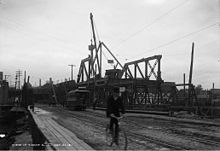 Penny-farthing and safety bicycles arrived in Toronto in the late-1800s. QueenStreetViaduct.jpg