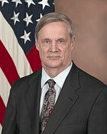 https://upload.wikimedia.org/wikipedia/commons/thumb/1/18/Robert_F._Hale%2C_Under_Secretary_of_Defense%2C_2009.jpg/150px-Robert_F._Hale%2C_Under_Secretary_of_Defense%2C_2009.jpg