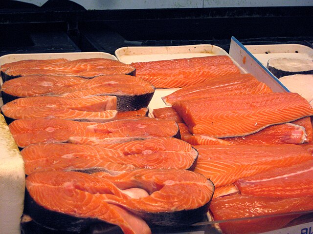 Salmon steak (left) and fillets (right) in a market
