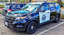 Black-and-white Ford Police Interceptor Utility in 2015 Sheriff San Diego County (23848300121).jpg