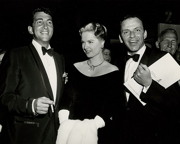 Flanked by Dean Martin and Frank Sinatra at Some Came Running (1958) premiere