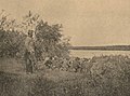 Српски војници у рову на обали реке.