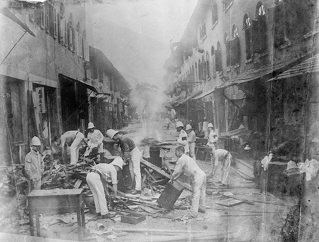 Soldiers cleaning out plague houses