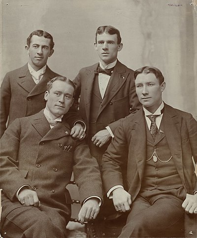 Kelley (sitting, left) with Baltimore Orioles teammates Hughie Jennings (sitting, right), Willie Keeler (standing, left), and John McGraw (standing, right)