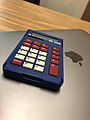 TI-108 on top of a MacBook Air (January 26, 2021) (OWNER OF THE WORK)