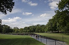 The Wall at the Vietnam Veterans Memorial, which is just north of the Vietnam Women's Memorial The Wall, end to end.jpg