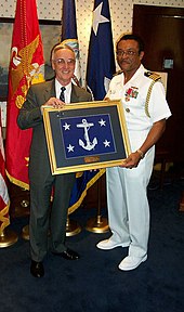 England with D.C. Curtis, August 2002 US Navy 020821-N-1928O-003 SECNAV presents a SECNAV flag.jpg