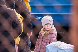 A young refugee in Przemysl train station in Poland Ukrainian children are fleeing Russian aggression. Przemysl, Poland 27 02 2022 (51913859740).jpg