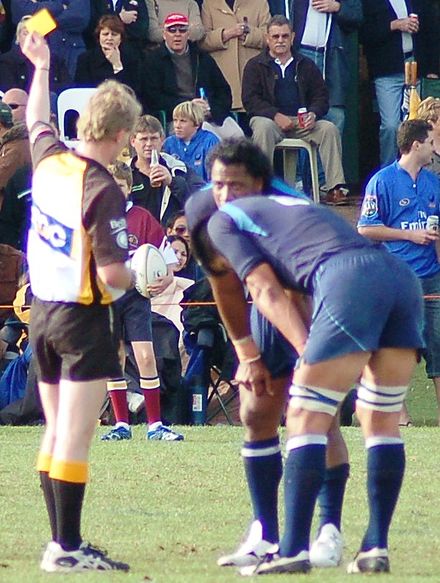 A rugby union player being sent to the "sin bin"