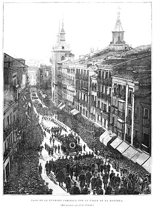 1893-01-30, Španělské a americké osvícení, Madrid, Zorrillin pohřeb, průchod pohřebního doprovodu přes Calle de la Montera, Comba.jpg