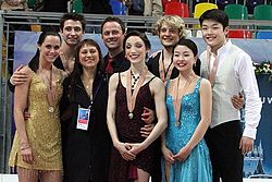 The Shibutanis with the other medalists and their coaches at the 2011 World Championships 2011 World Championships Dance Podium 1.jpg