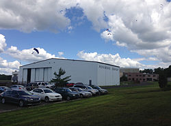 2014-08-24 13 15 57 Skydivers parachuting to the ground at Pennridge Airport in East Rockhill Township, Pennsylvania.JPG