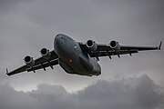 A Boeing C-17 Globemaster III, tail number 95-0103, taking off from RAF Mildenhall in the United Kingdom. It is assigned to the 62nd Airlift Wing and the 446th Airlift Wing at Joint Base Lewis McChord in Washington, USA.