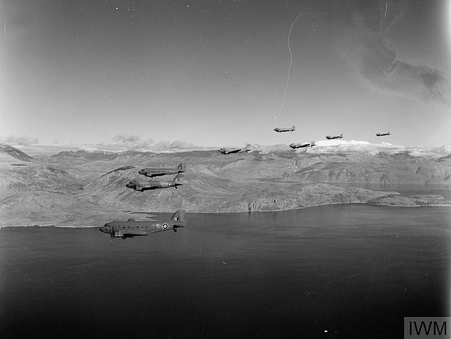 A loose formation of Douglas Dakota Mark IIIs of No. 267 Squadron RAF based at Bari, Italy, flying along the Balkan coast.